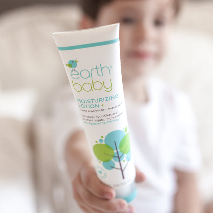 Child holding Non-Toxic, Hypoallergenic Moisturizing Lotion